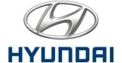 The Hyundai logo featuring a silver stylized H inside an oval, with the brand name HYUNDAI written in bold blue letters below it.