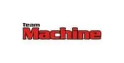 Logo with the words Team Machine in bold text; Team is in small black letters, and Machine is in large red, blocky letters with a black outline, all on a white background.