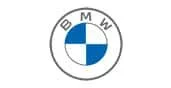 BMW logo featuring a circular design with the letters B M W at the top and a central circle divided into blue and white quadrants.