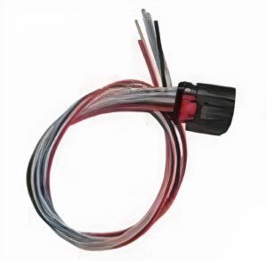 Close-up of an electrical wire harness with multiple colored wires ending in a black plastic connector; the wires are red, gray, black, and white.
