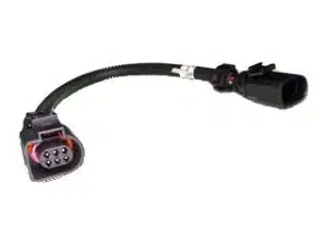 A close-up of an automotive electrical wiring harness with a flexible black conduit and multi-pin connectors on both ends, designed for vehicle electronic systems.
